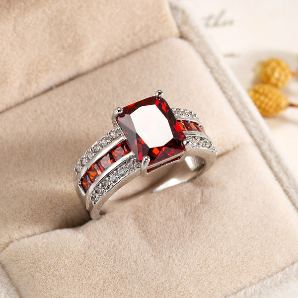 Bague rubis anneau divisé argentée