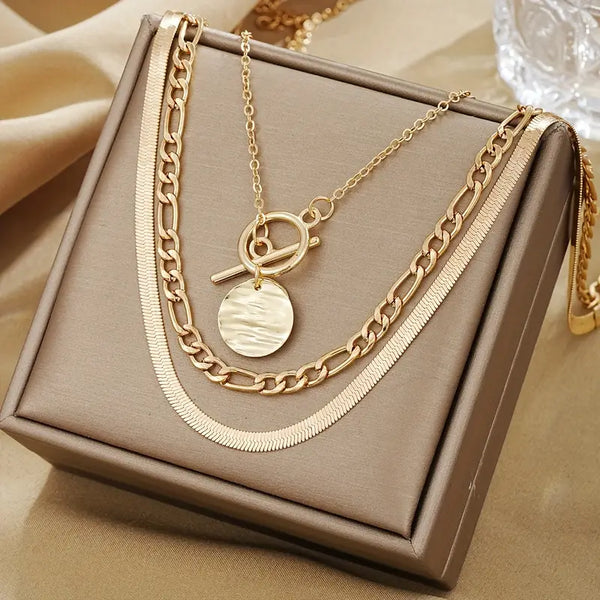 Savira | Collier multirangs médaille texturée | Or