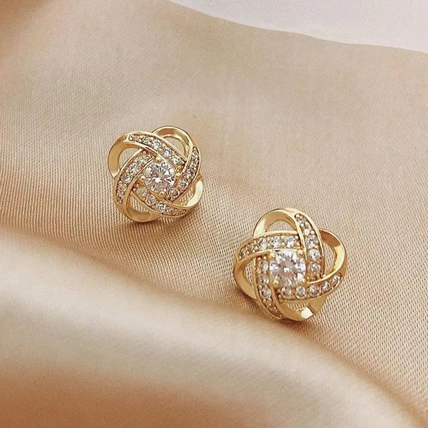 Boucles d'oreilles en zirconium avec nœud