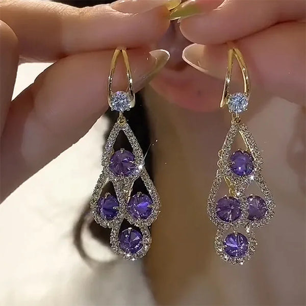 Boucles d'oreilles pendantes cristal violet