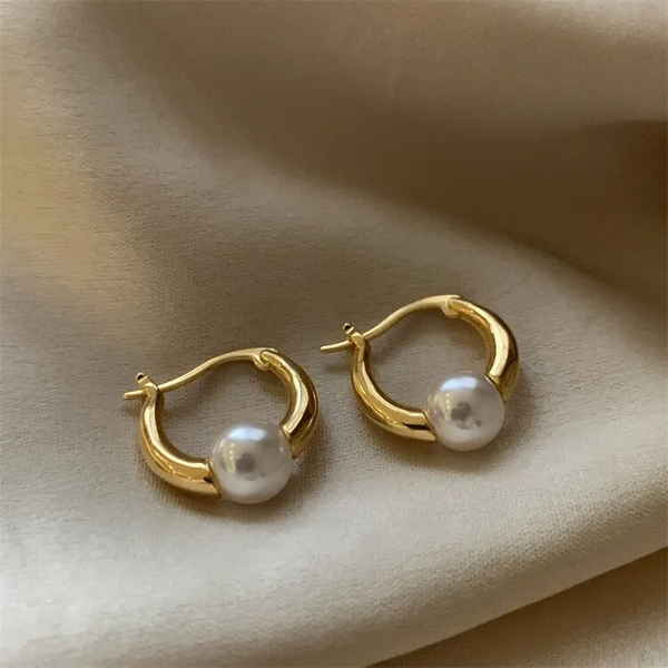 Boucles d'oreilles perles dorées élégantes