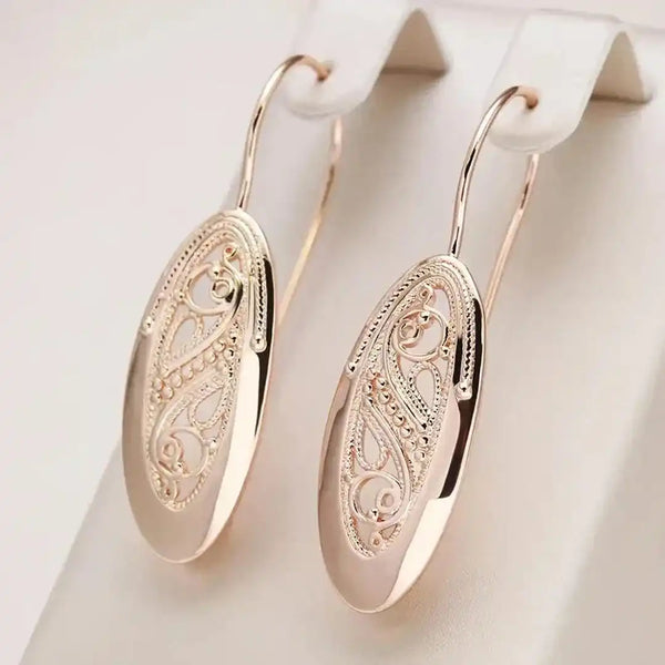 Boucles d'oreilles pendantes dorées scintillantes
