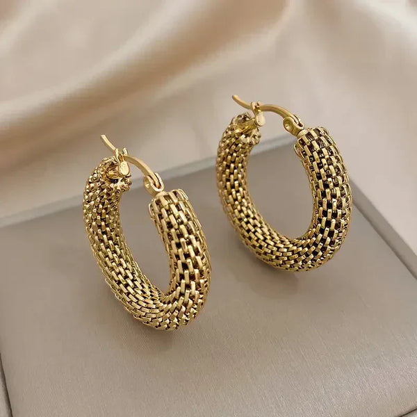 Boucles d'oreilles en forme de vague dorée | or