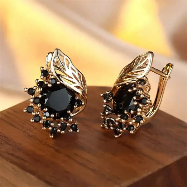Boucles d'oreilles en or avec zircon noir