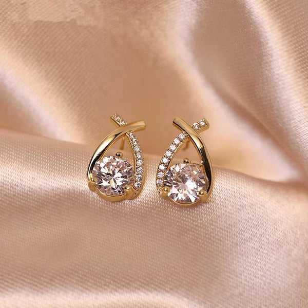 Boucles d'oreilles en cube avec goutte torsadée luxueuse