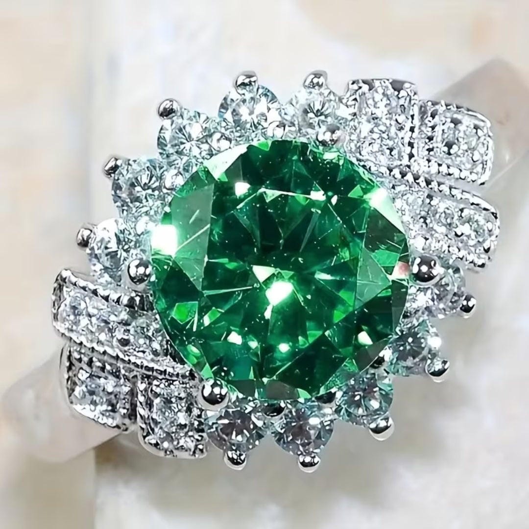 Bague Grand Halo Émeraude Imposante
