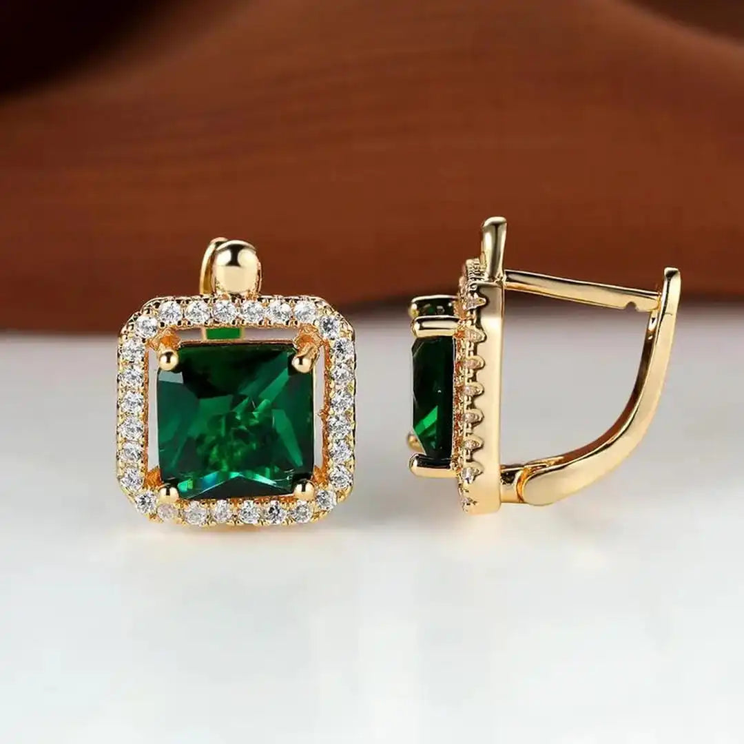 Boucles d'oreilles en or avec zirconium carré vert doré