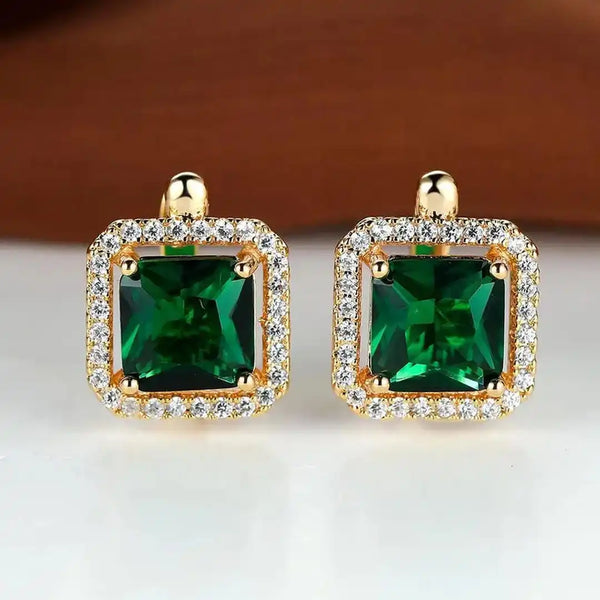 Boucles d'oreilles en or avec zirconium carré vert doré