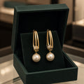 Boucles d'oreilles vintage en perles dorées