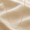 Collier en boîte doré minimaliste