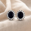 Boucles d'oreilles en saphir blanc ovale