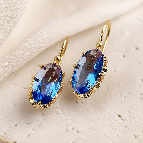 Boucles d'oreilles en fleur dorée et bleue