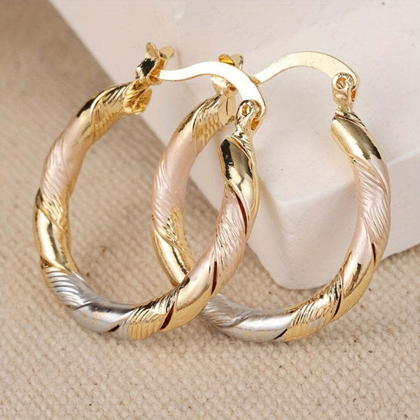 Boucles d'oreilles vintage en forme de cercle en or, argent et rose