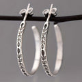 Boucles d'oreilles en anneau argenté