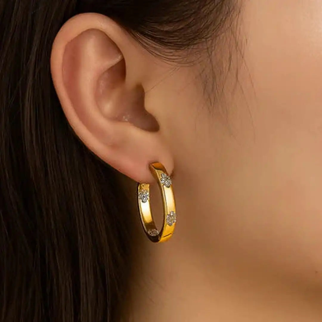 Boucles d'oreilles vintage en forme de fleur dorée