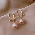 Boucles d'oreilles en perles goutte d'eau rose élégantes