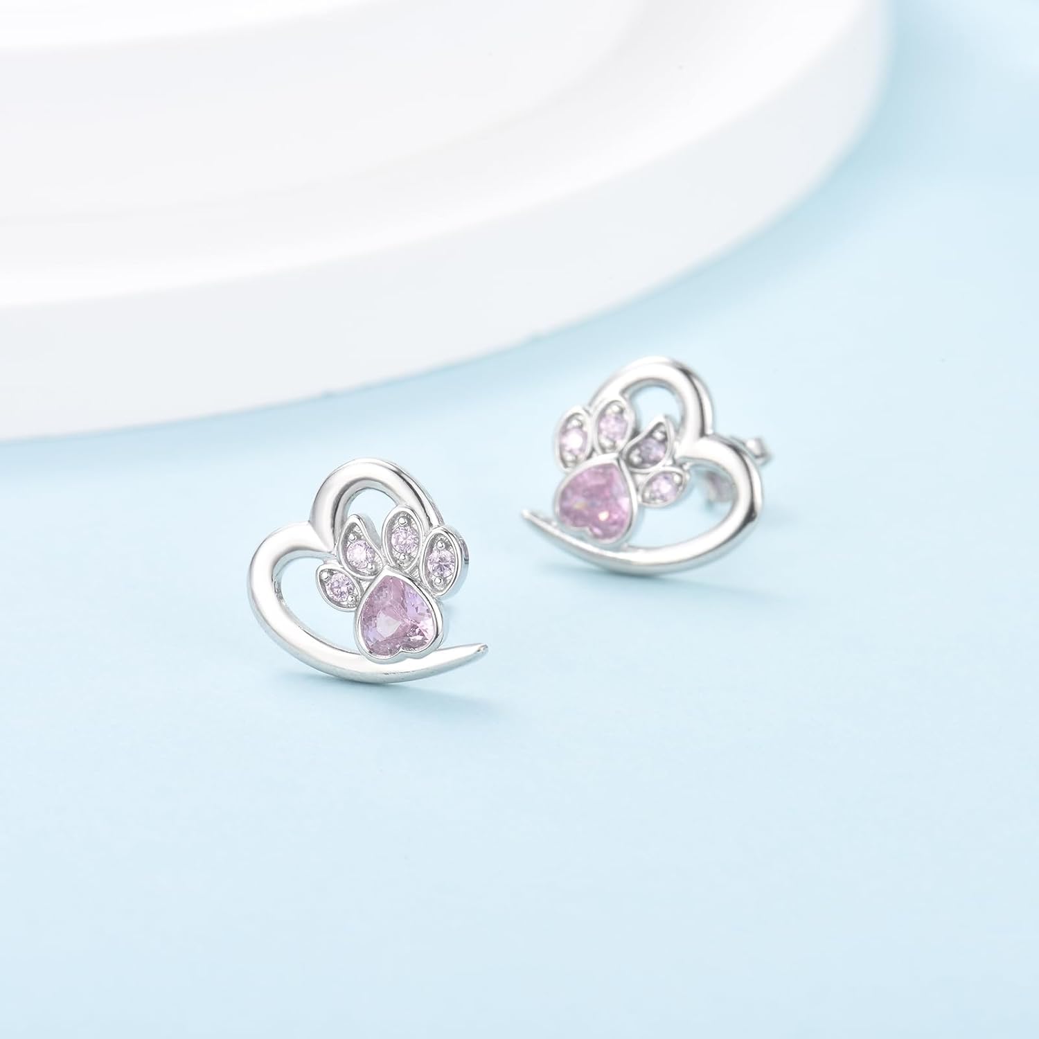 Boucles d'oreilles en forme de patte et de cœur avec zircon