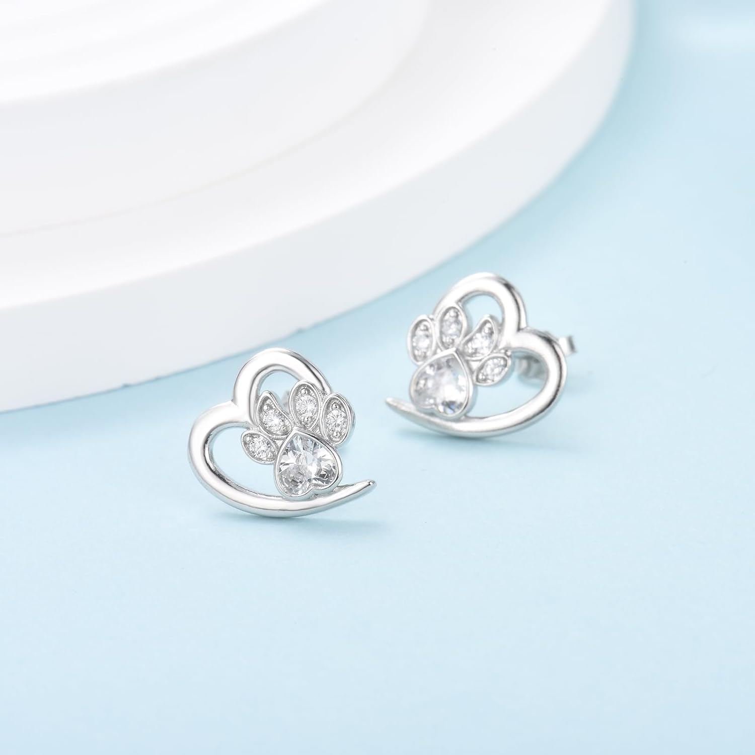 Boucles d'oreilles en forme de patte et de cœur avec zircon