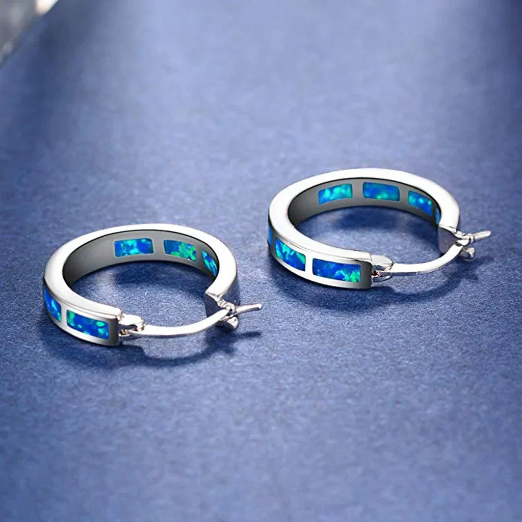 Boucles d'oreilles en cercle en opale bleue