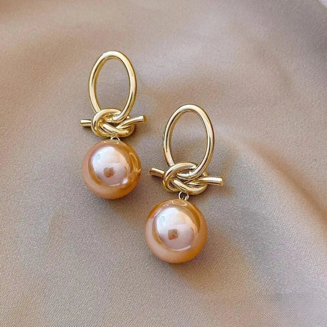 Boucles d'oreilles en perles goutte d'eau rose élégantes