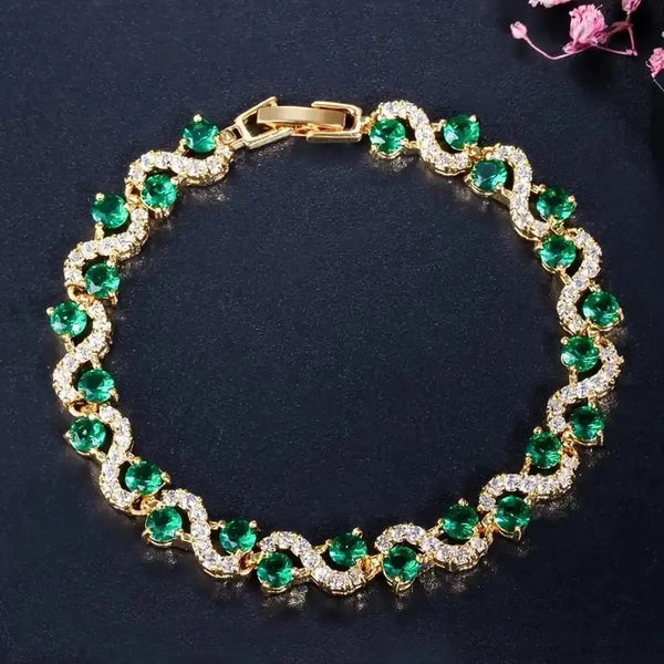 Bracelet en or avec cristal émeraude