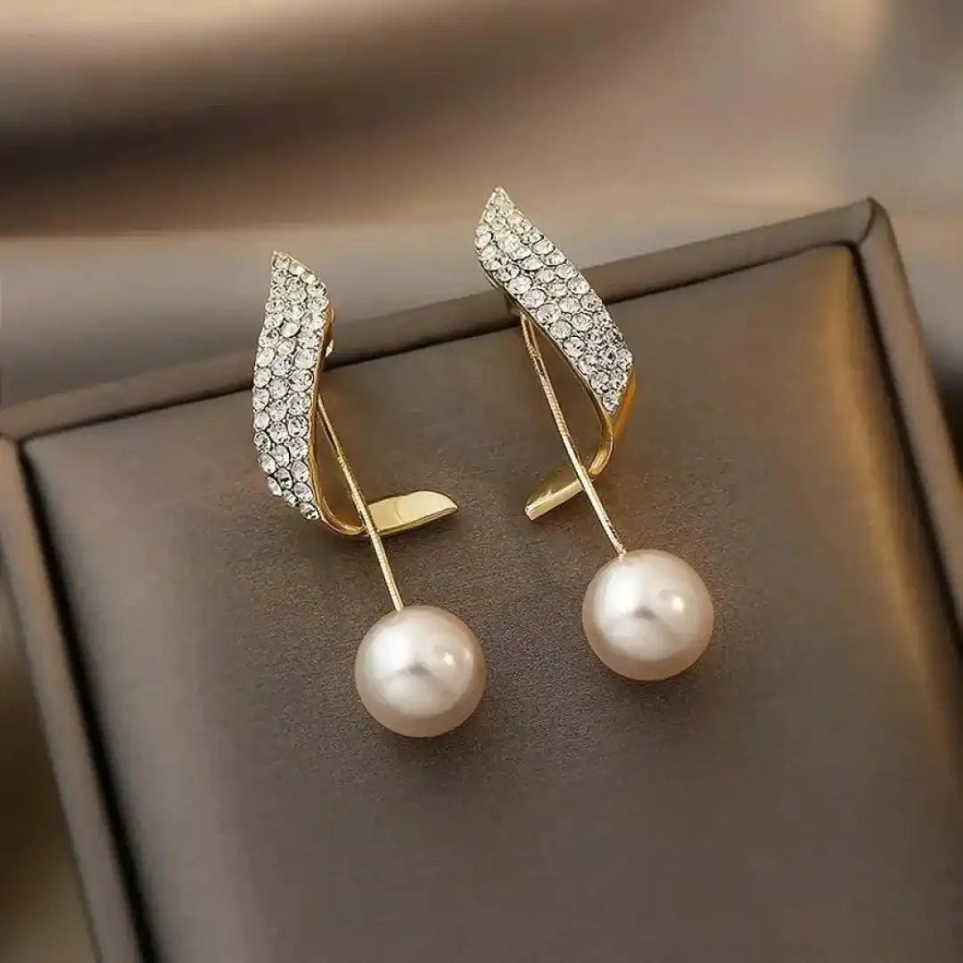 Boucles d'oreilles en or Helmi Pisara élégantes