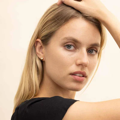 Ball™ | Puces d'oreilles dorées