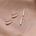Boucles d'oreilles pendantes antiques dorées et argentées