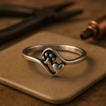 Bague vintage en argent sterling avec une patte et un cœur