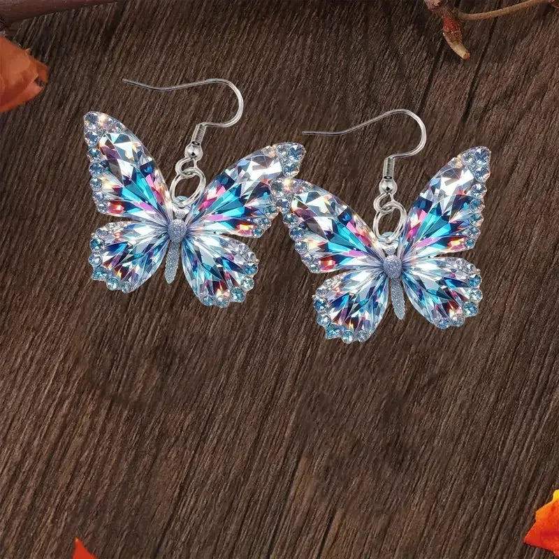 Boucles d'oreilles en forme de papillon scintillant