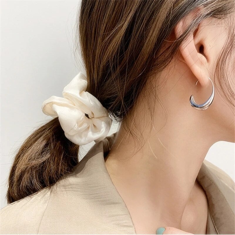 Boucles d'oreilles rondes en or et argent