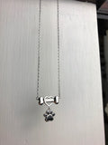Collier en acier inoxydable en forme de patte de chien Siro