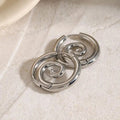 Boucles d'oreilles spirales en or intemporelles