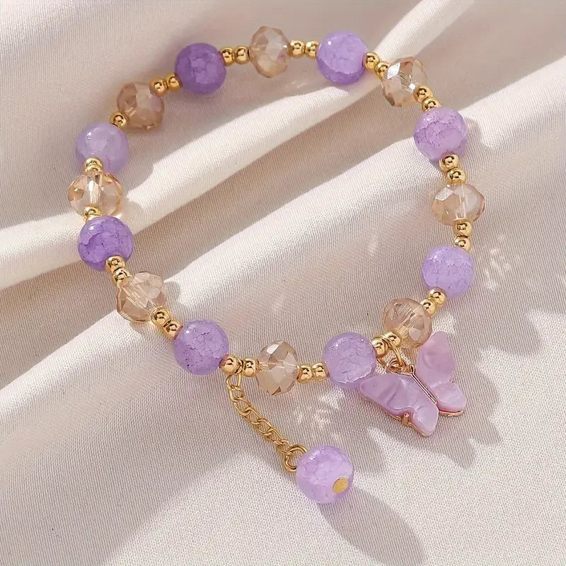 Jolie bracelet en perles avec un papillon