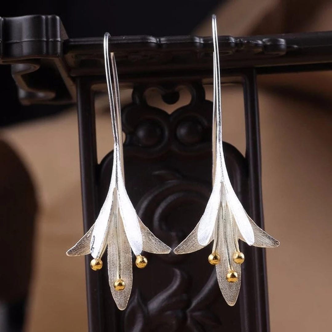 Boucles d'oreilles en argent élégantes avec fleurs