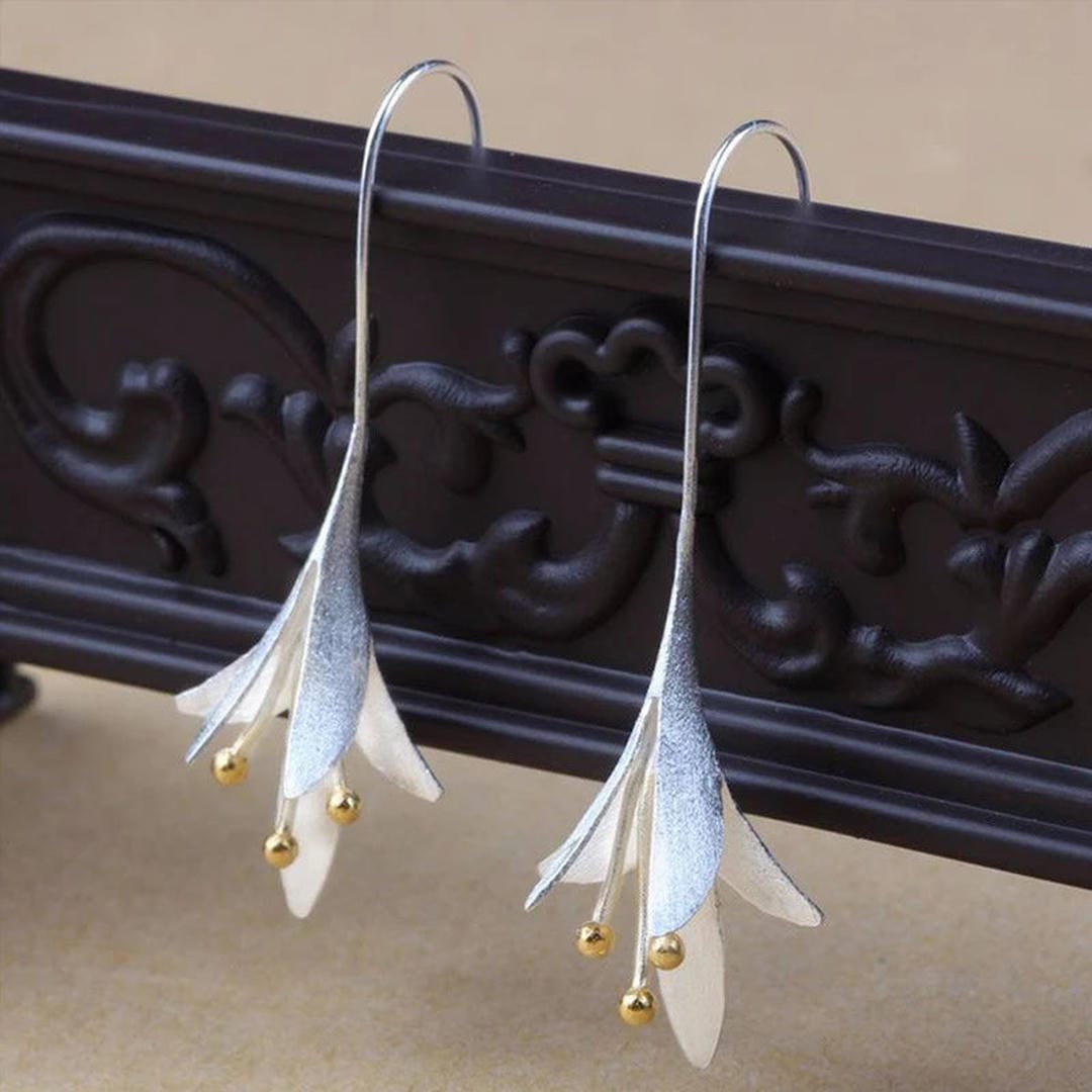 Boucles d'oreilles en argent élégantes avec fleurs