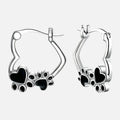 Boucles d'oreilles huggie en forme de cœur avec émail noir