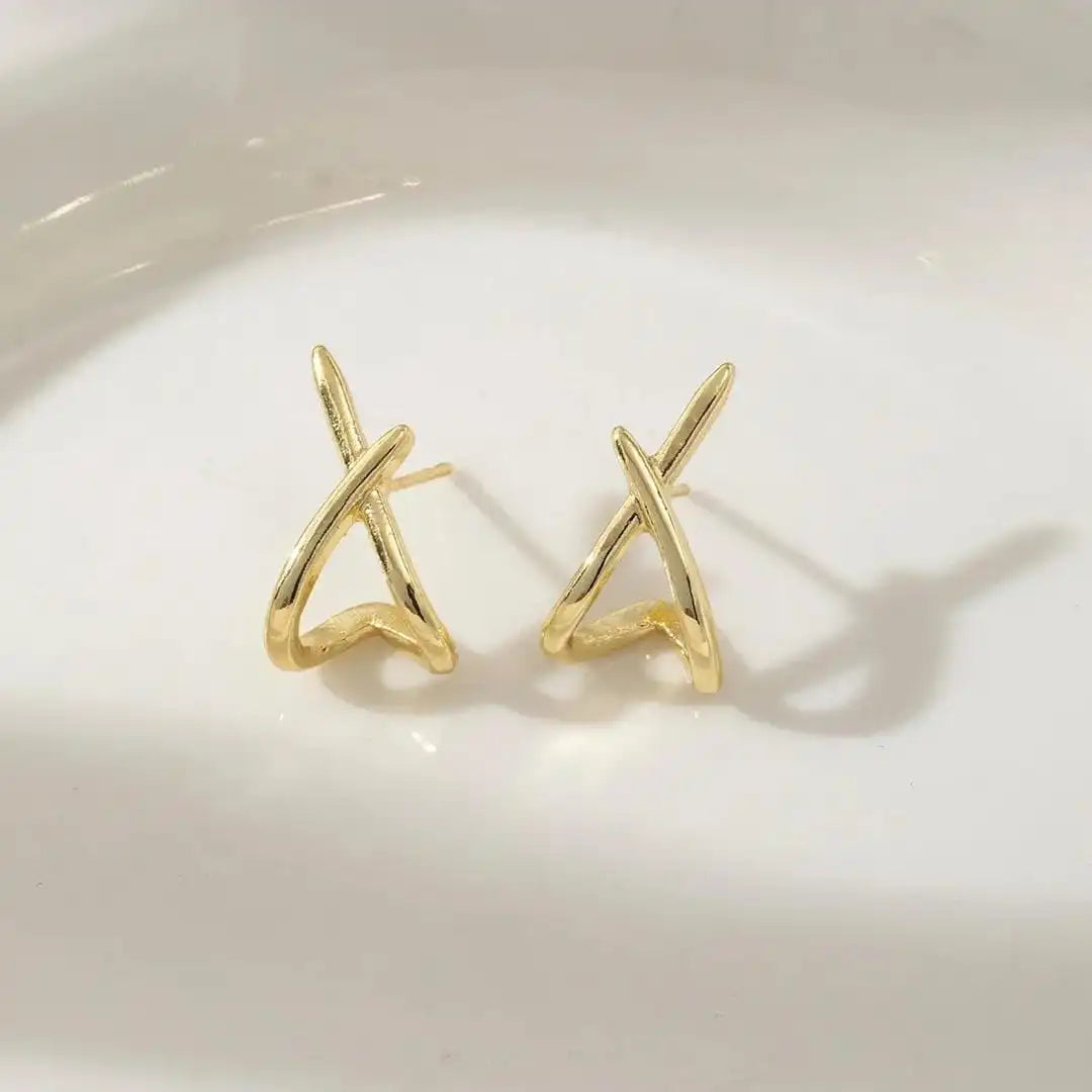 Boucles d'oreilles croix en or intemporelles