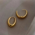 Boucles d'oreilles en anneau dorées classiques