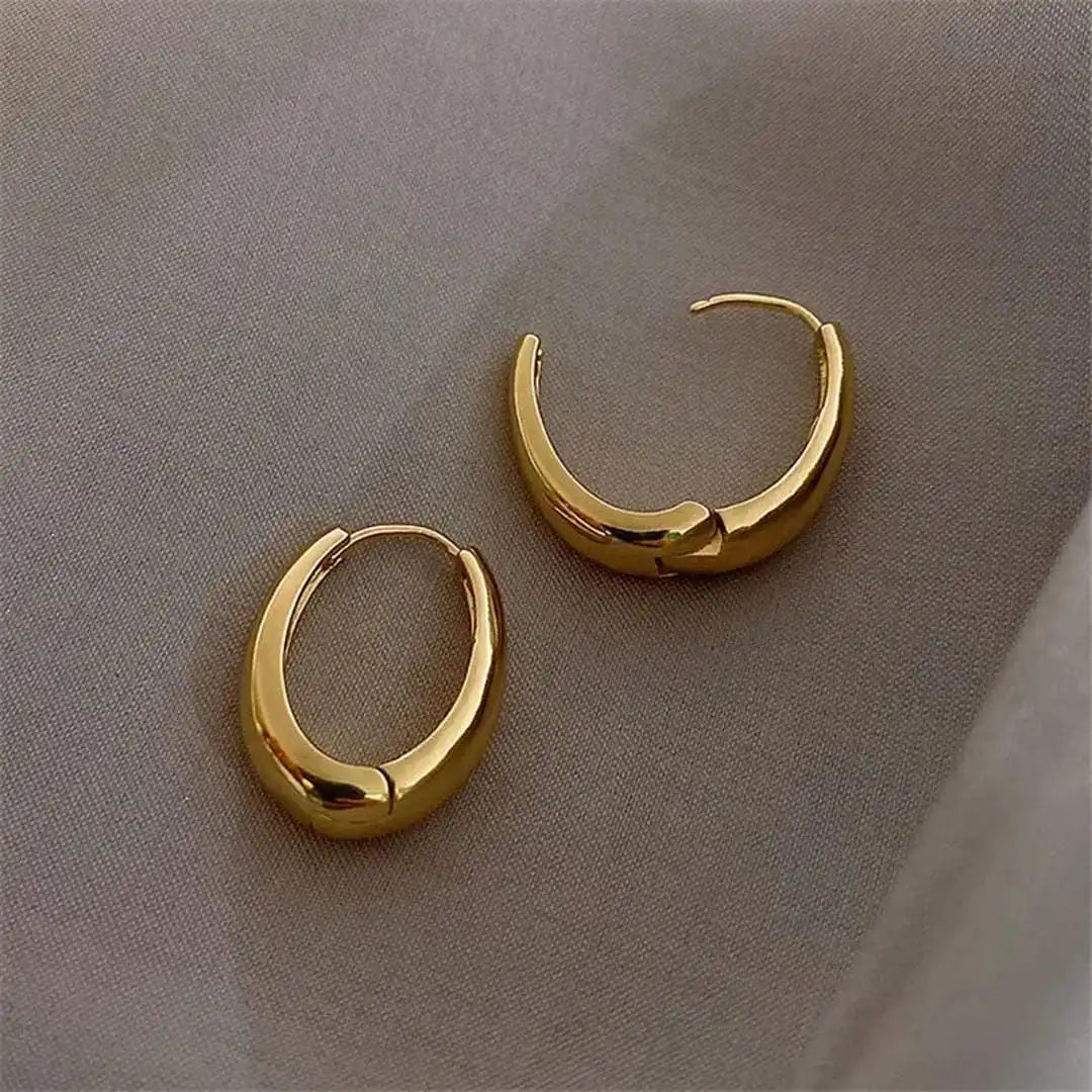 Boucles d'oreilles en anneau dorées classiques