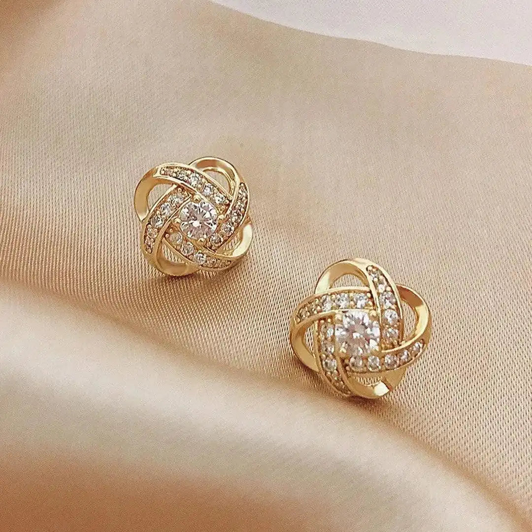 Boucles d'oreilles en zirconium avec nœud