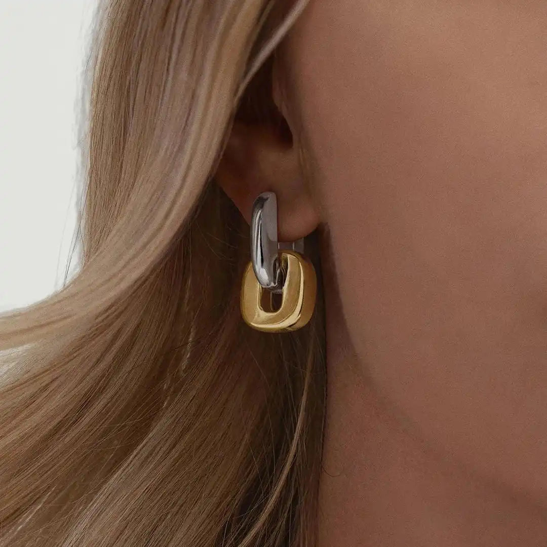 Boucles d'oreilles ovales en or bicolore minimalistes