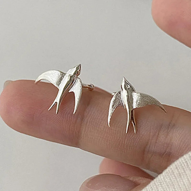 Jolies boucles d'oreilles clips en argent en forme d'hirondelle