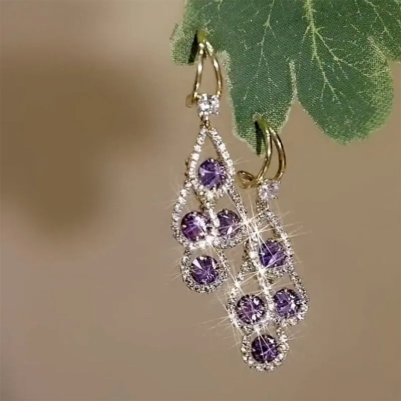 Boucles d'oreilles pendantes cristal violet