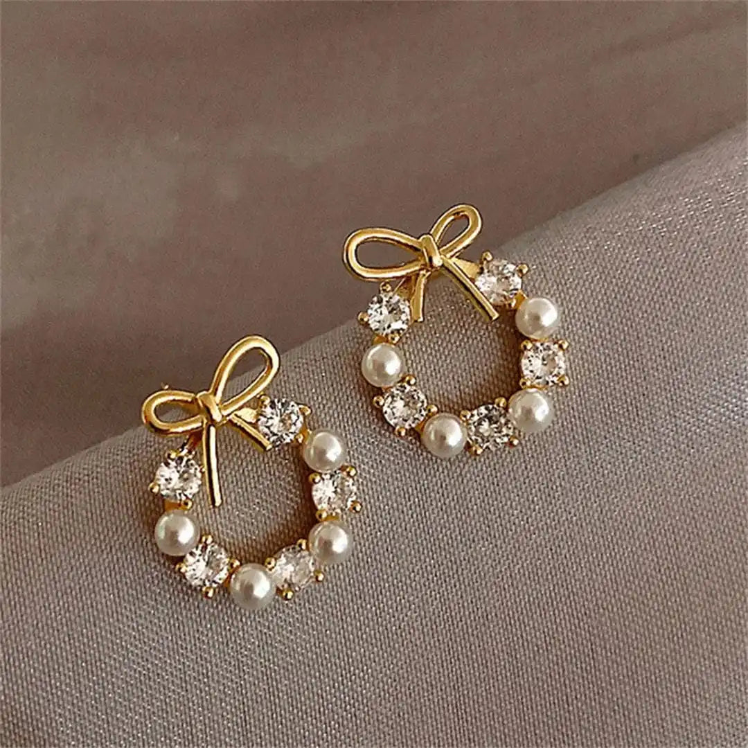 Boucles d'oreilles rondes en perles avec nœud