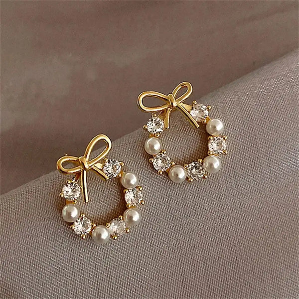 Boucles d'oreilles rondes en perles avec nœud