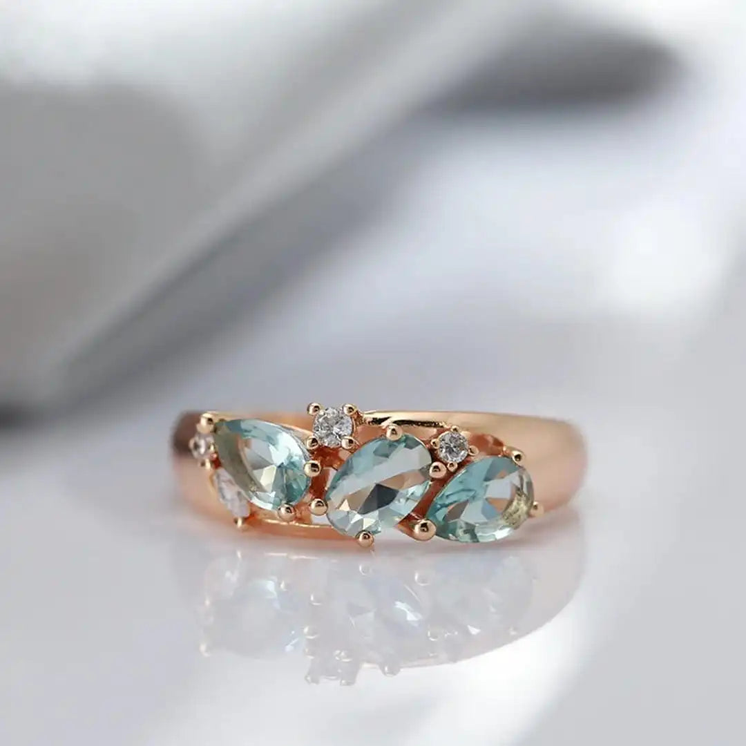 Bague vintage en zircon bleu et or rose