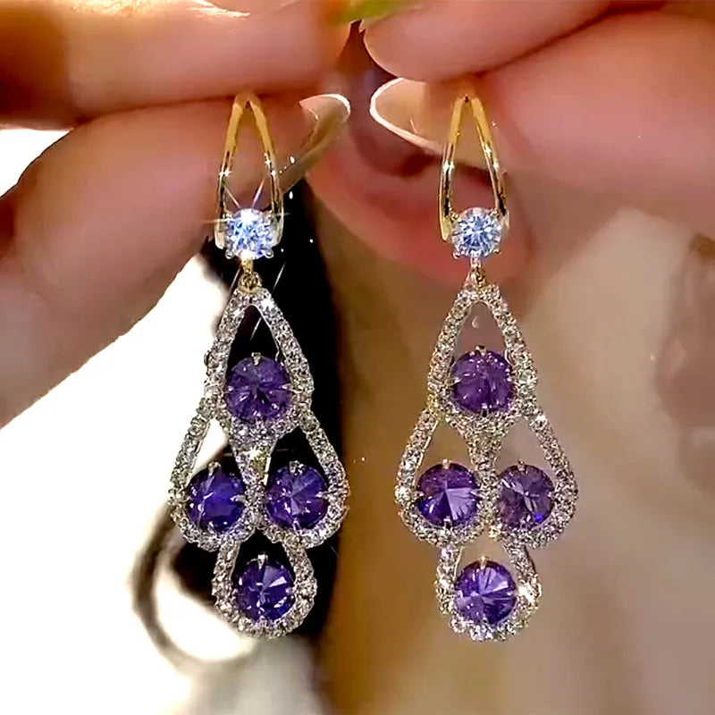 Boucles d'oreilles pendantes cristal violet
