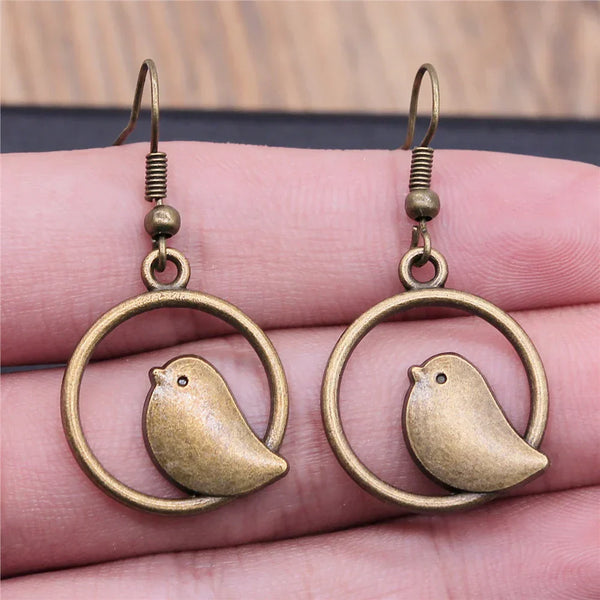 Boucles d'oreilles pendentif vintage en forme d'oiseau – bijou boho fait main