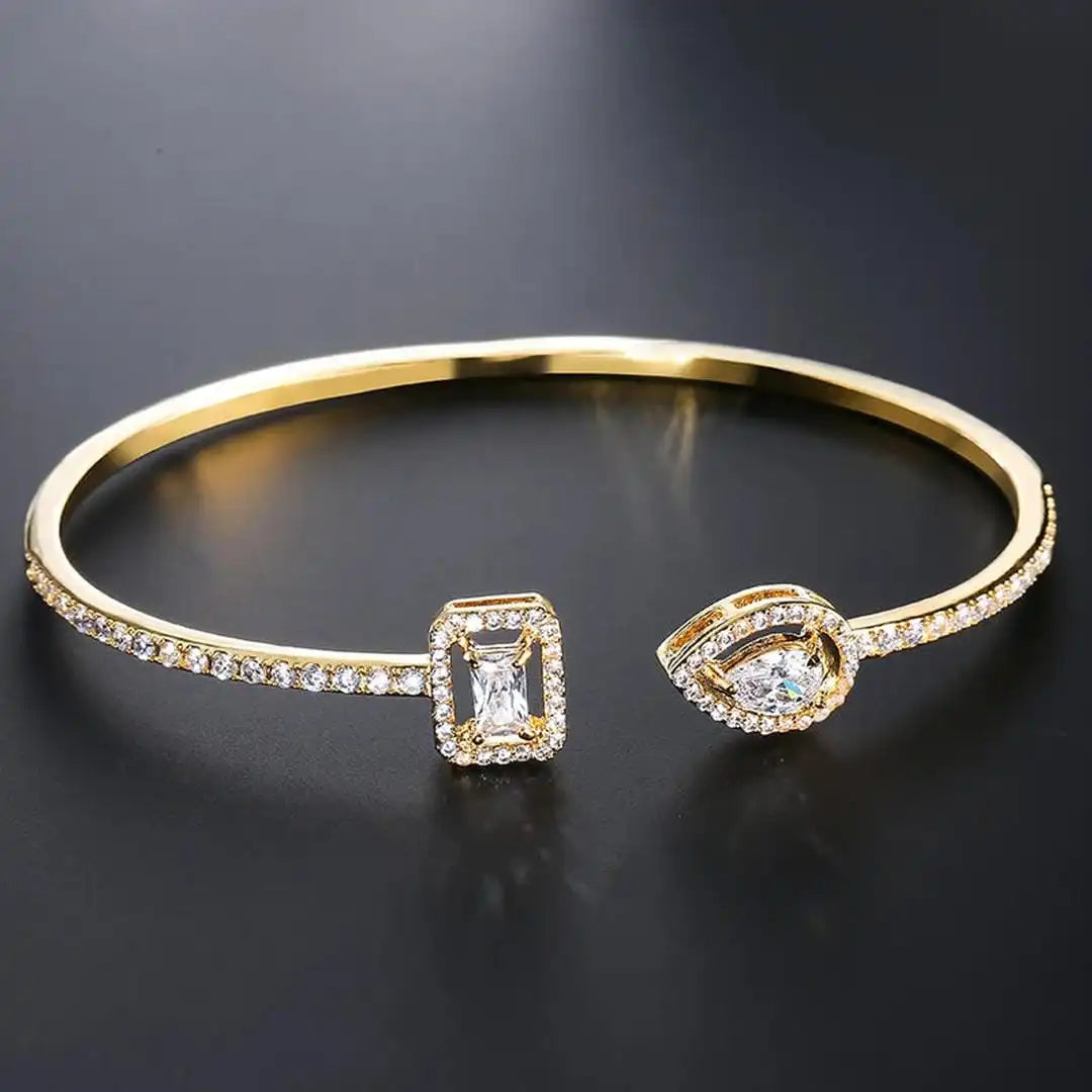 Bracelet ouvert en or avec deux pierres